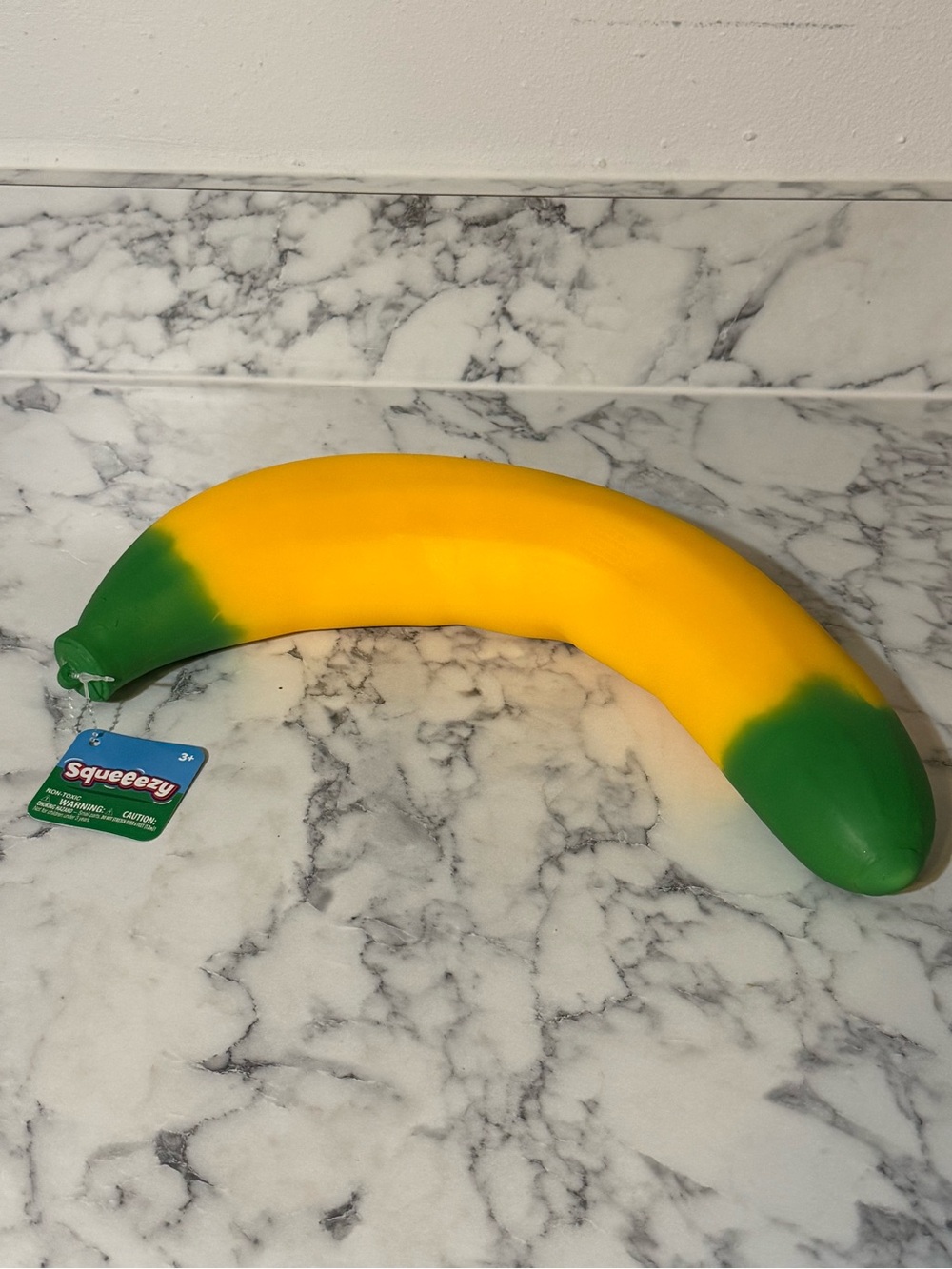 NEW Sunny Days Squeezy Banana Squishy Toy Yellow/Green Jumbo Size Fidget Stress